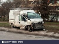 crushed-in-car-accident-transport-van-2B8Y32H.jpg