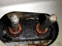 Nearside internal hinge rusting and potential leak.jpg