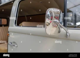 detail-at-shiny-wing-side-mirror-of-vintage-and-classic-vw-volkswagen-bus-or-van-at-at-classi...webp detail-at-shiny-wing-side-mirror-of-vintage-and-classic-vw-volkswagen-bus-or-van-at-at-classi...webp