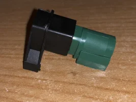 green & black piggy back part.webp