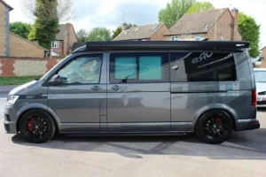Near side view with awning bar and graphics.jpg Near side view with awning bar and graphics.jpg