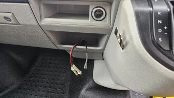Drilled hole with wires.jpg
