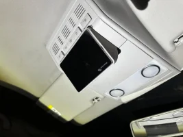 A car interior with a screen  AI-generated content may be incorrect.