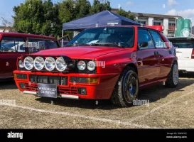 a-red-lancia-delta-hf-integrale-evoluzione-car-with-speedline-montecarlo-alloy-wheels-carbon-...webp