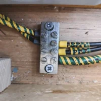 Main Earthing Terminal with chassis, fuseboard and bonding conductors connected