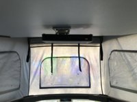Projector on pop up bed.jpg