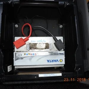 Battery on plate with seat box fitted.