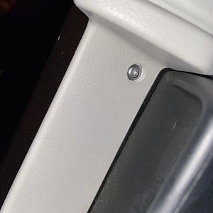 Sliding Door, tiny torx screw behind the handle.