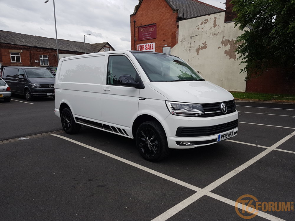 white volkswagen transporter